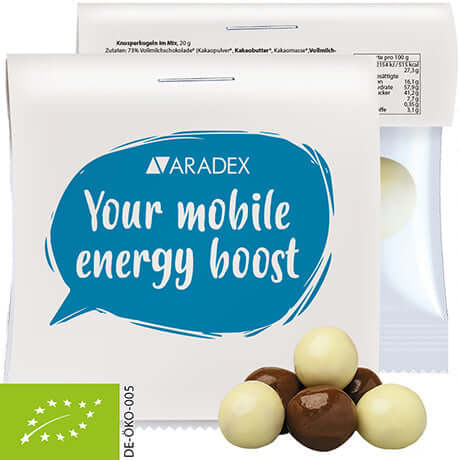 Bedrukte biologische Crunch Choco's, ca. 20g, in maxi-zakje met topkaart en eigen logo — promotioneel snoepje