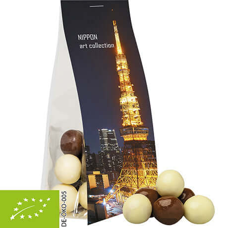 Bedrukte biologische Crunch Choco's, ca. 20g, in standzakje met topkaart en eigen logo — promotioneel snoepje