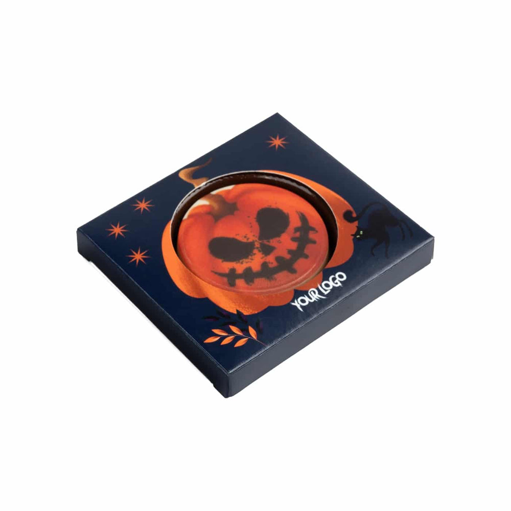 Bedrukte ronde Halloween chocolade in de verpakking, schuin van boven gezien