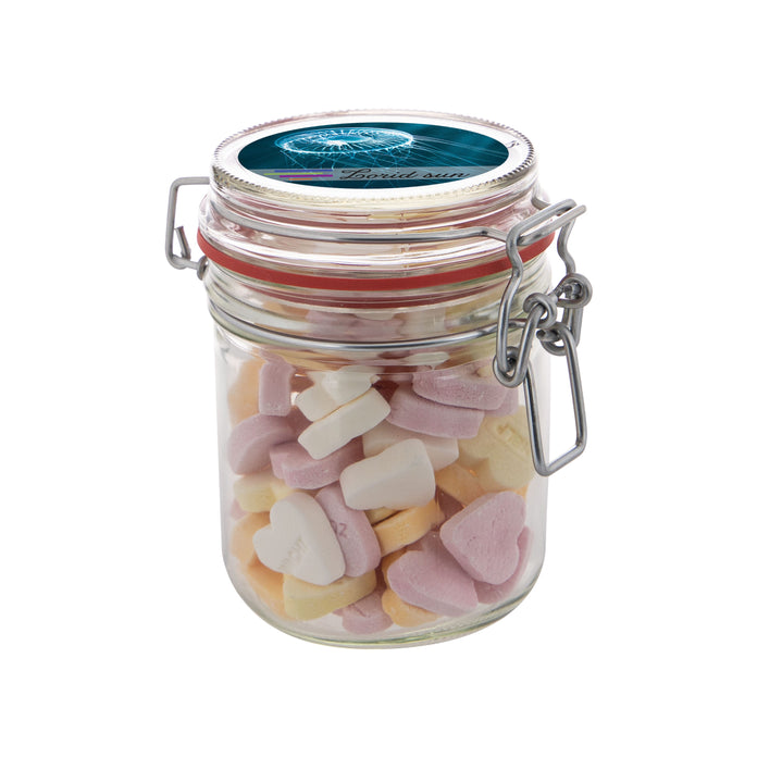 Glazen weckpot van 0,4 liter gevuld met snoep en ronde sticker met logo op het deksel: Vruchtenhartjes