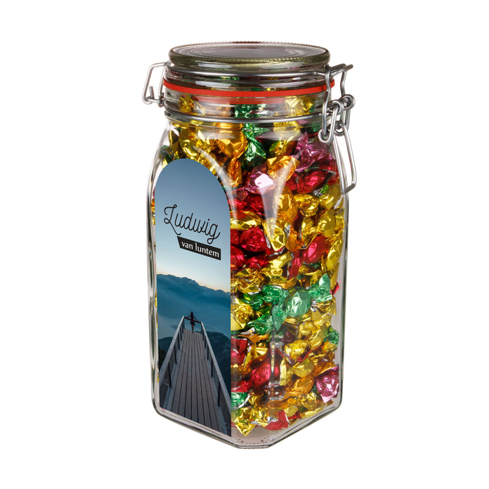 Grote glazen weckpot van 1,5 liter gevuld met snoep en sticker met logo op de voorzijde: Metallic sweets