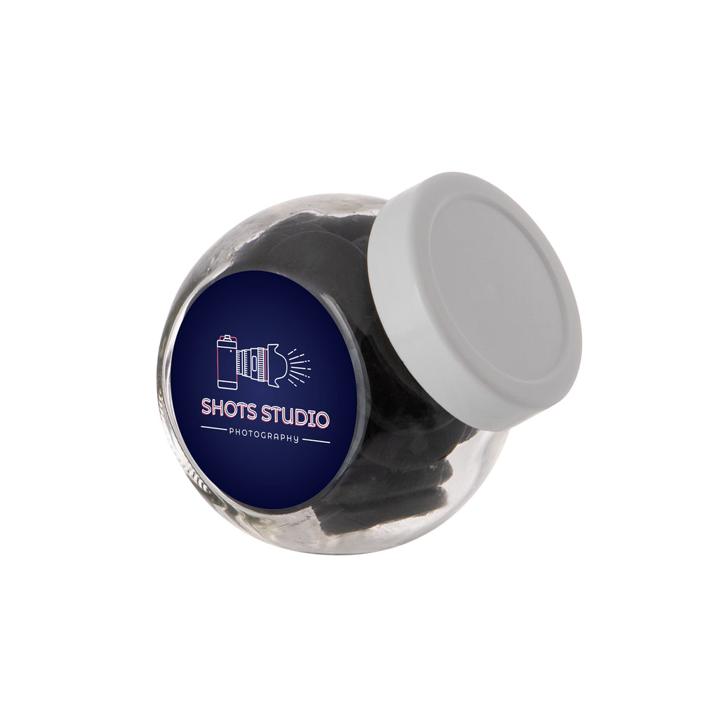 Mini glazen potje van 0,2 liter met wit deksel, gevuld met snoep en sticker met logo: Muntdrop / Wit