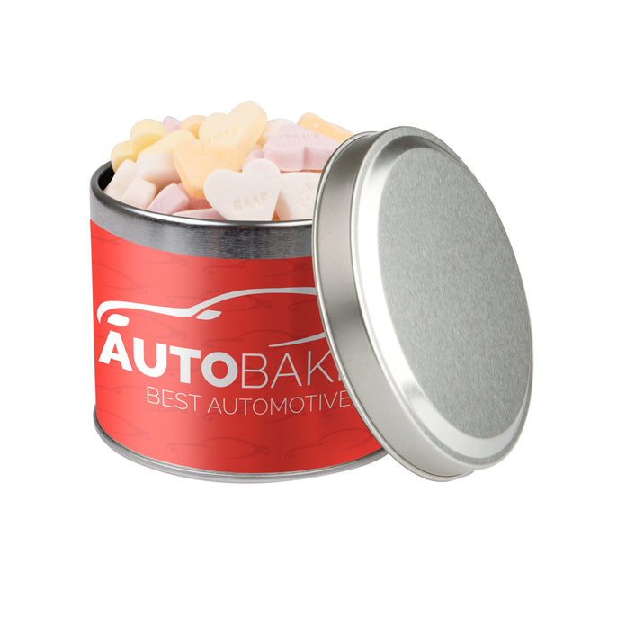 Laag rond snoepblik van 0,6 liter in zilver met een full colour bedrukte wikkel met logo: Vruchtenhartjes