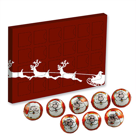 Rode adventskalender met kerstmotief en chocoladebonbons in kerstmanfolie