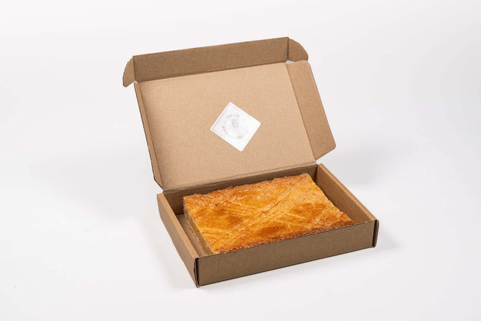 Halve boterkoek door de brievenbus