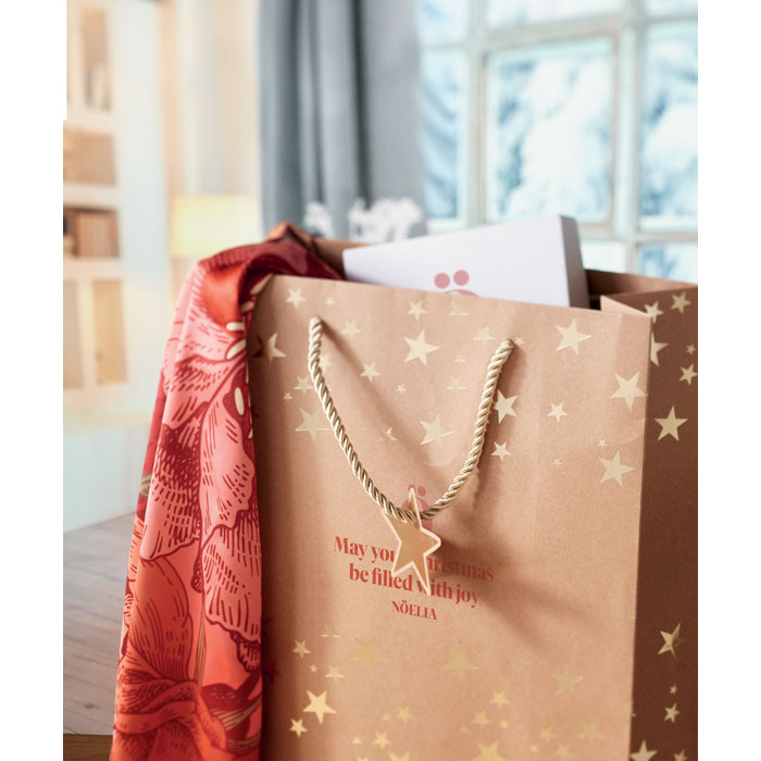 Kraftpapieren geschenkzak Sparkle met een bedrukking als voorbeeld