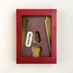 Chocoladeletter met logo A van melkchocolade