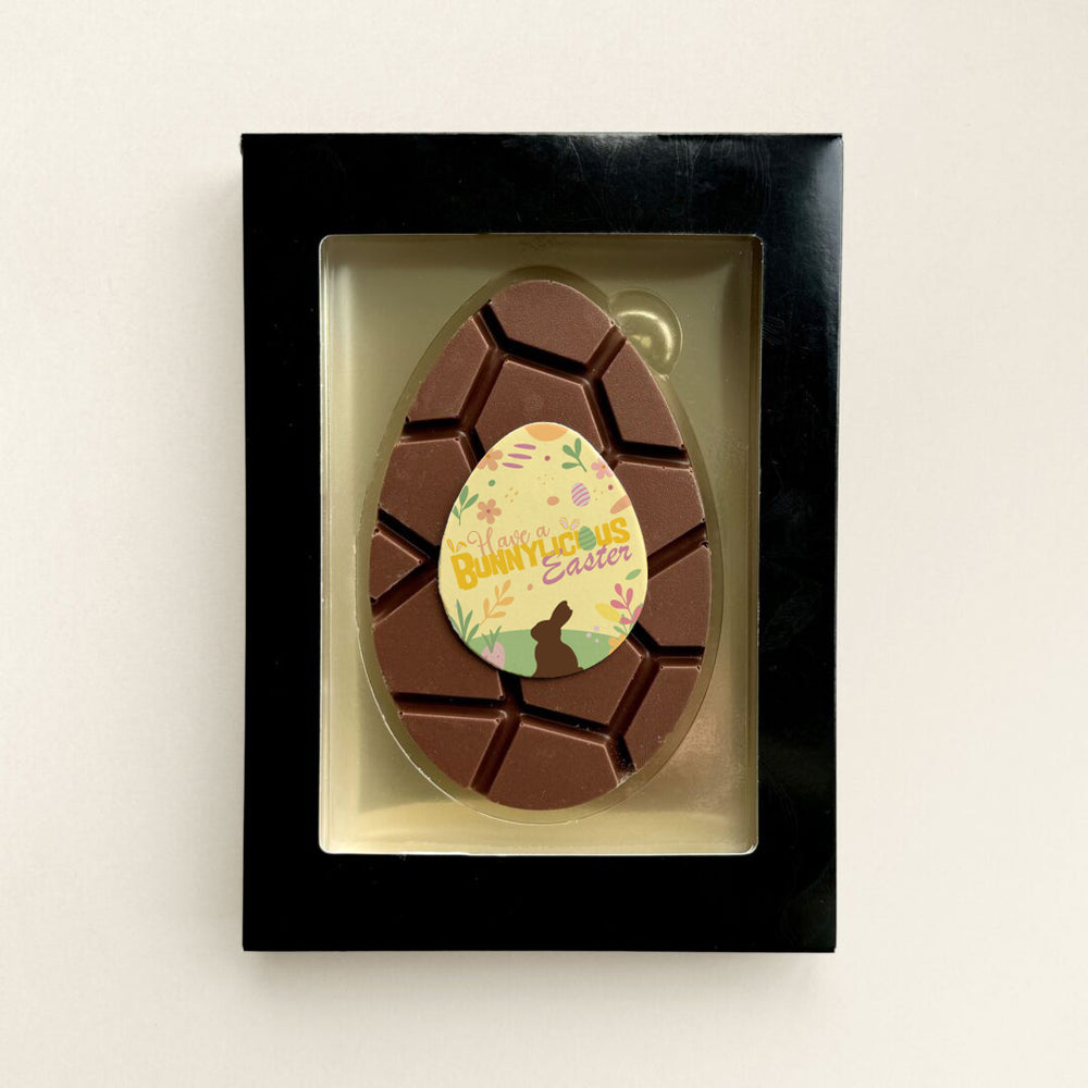 Chocolade paasei met logo, uitvoering melk, paasdesign