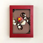 Chocoladeletter S met gechocolateerde kruidnoten (250 gram)