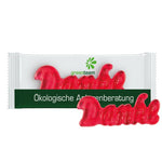 Flowpack van composteerbare transparante folie met Trolli fruitgom en een eigen ontwerp
