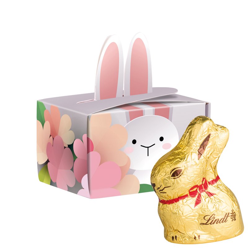Wit kartonnen mini paasdoosje met haasjesoren en Lindt chocoladehaasje