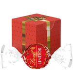 Wit kartonnen kubusdoosje met een Lindt LINDOR-bol en eigen ontwerp