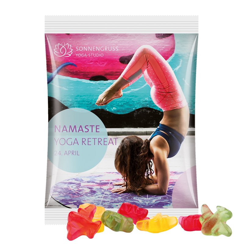 Maxi reclamezakje van witte folie met Trolli fruitgom in de vorm van een vliegtuigje