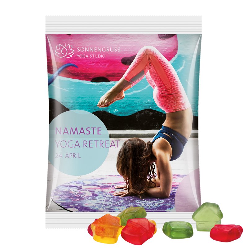 Maxi reclamezakje van witte folie met Trolli fruitgom in de vorm van een huisje