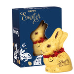 Wit kartonnen paasdoosje met haasvormige uitsparing en Lindt chocoladehaas van 50 gram