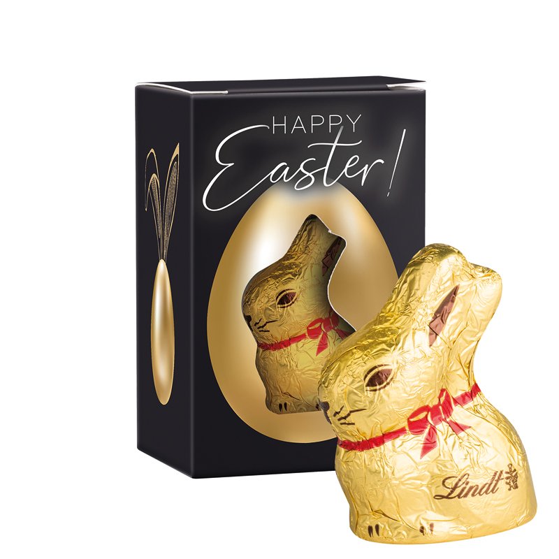 Klein wit kartonnen paasdoosje met haasvormige uitsparing en Lindt chocoladehaasje