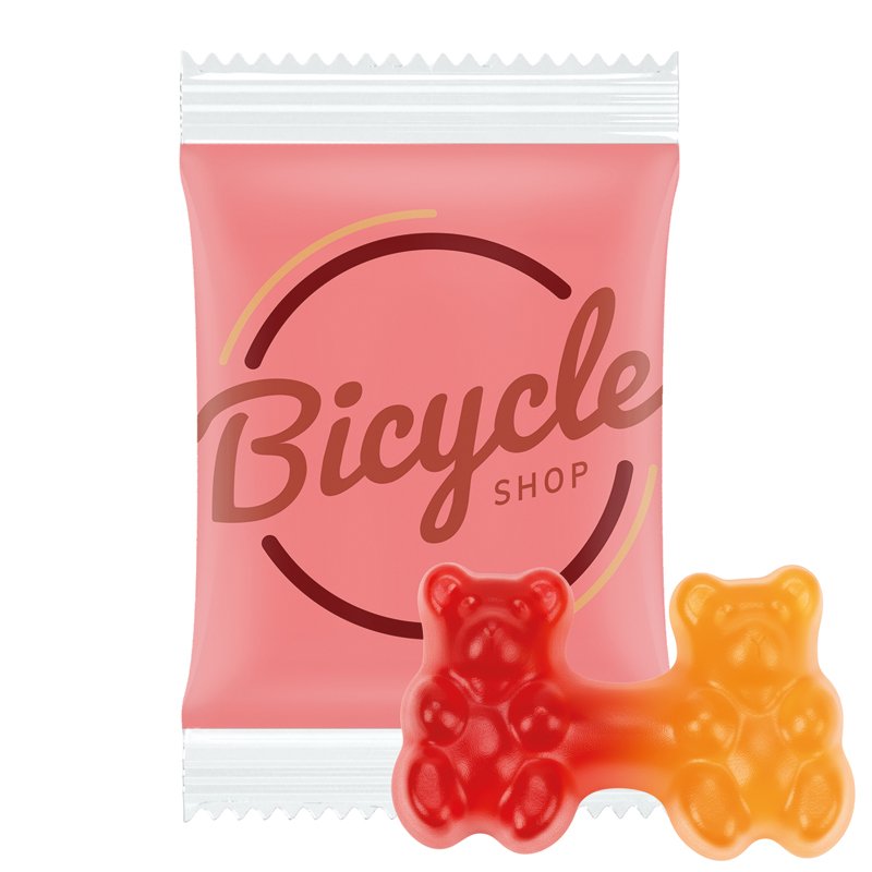 Flowpack van witte folie met Trolli fruitgom en een eigen ontwerp