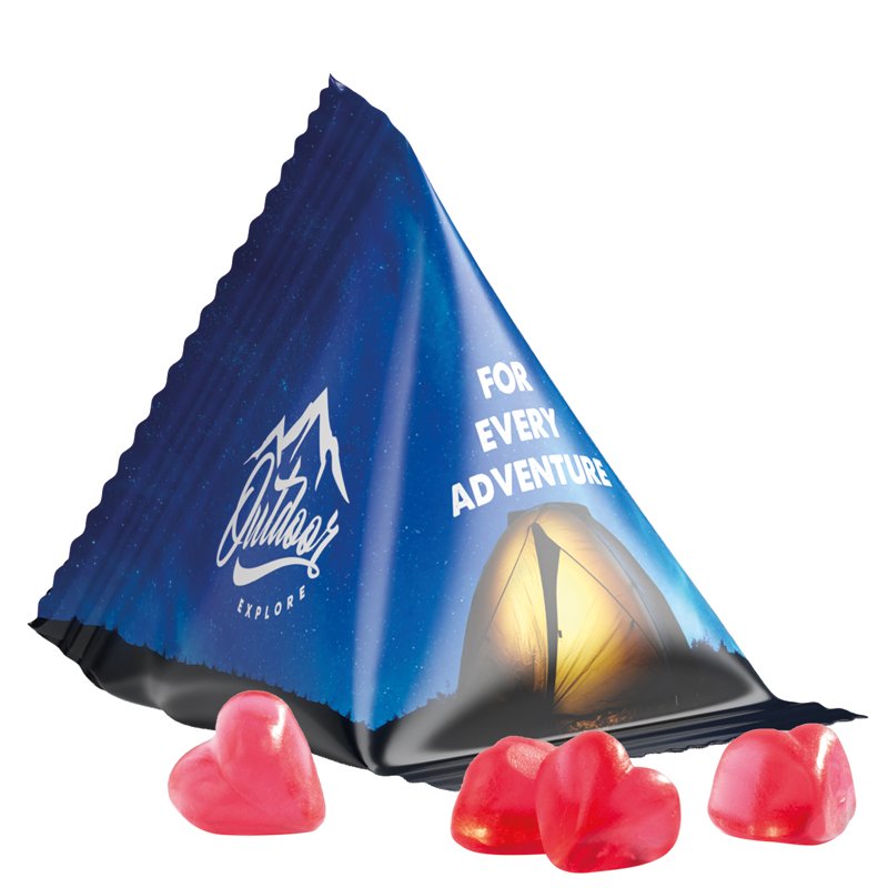 Tetraëderzakje van witte folie met Trolli fruitgom in de vorm van een hartje
