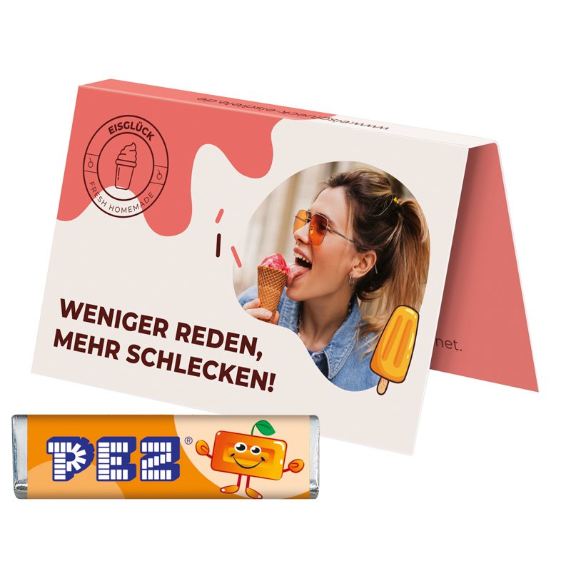 Uitvouwbaar visitekaartje met PEZ-snoepstaafje, sinaasappel