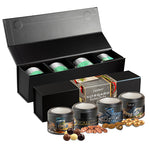 Zwarte geschenkdoos met vier vensterblikjes met noten en chocolade