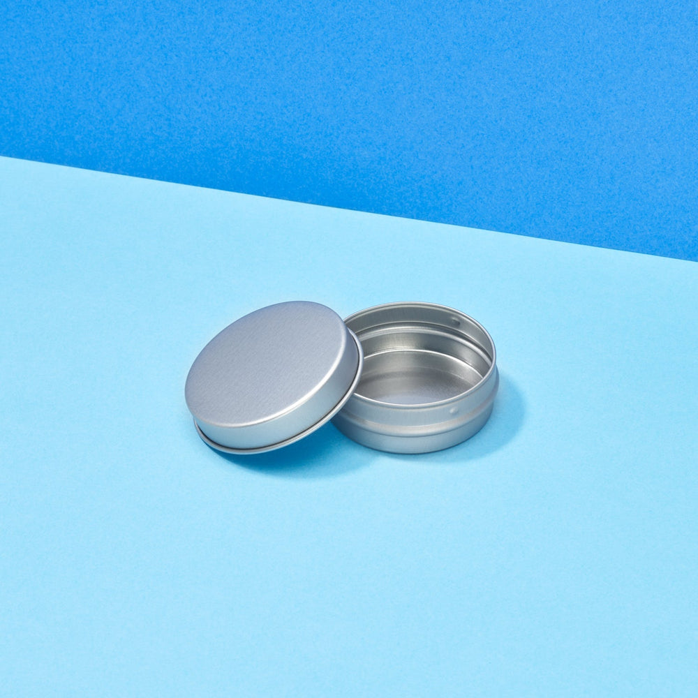 Rond zilver lippenbalsem blikje, foto 1