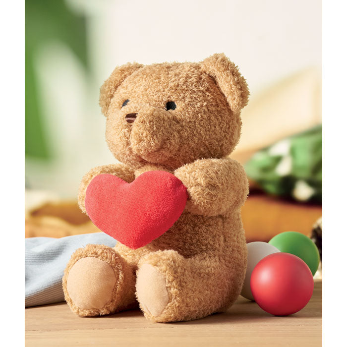 Pluche teddybeer met hart 23 cm Snuggle, sfeerfoto