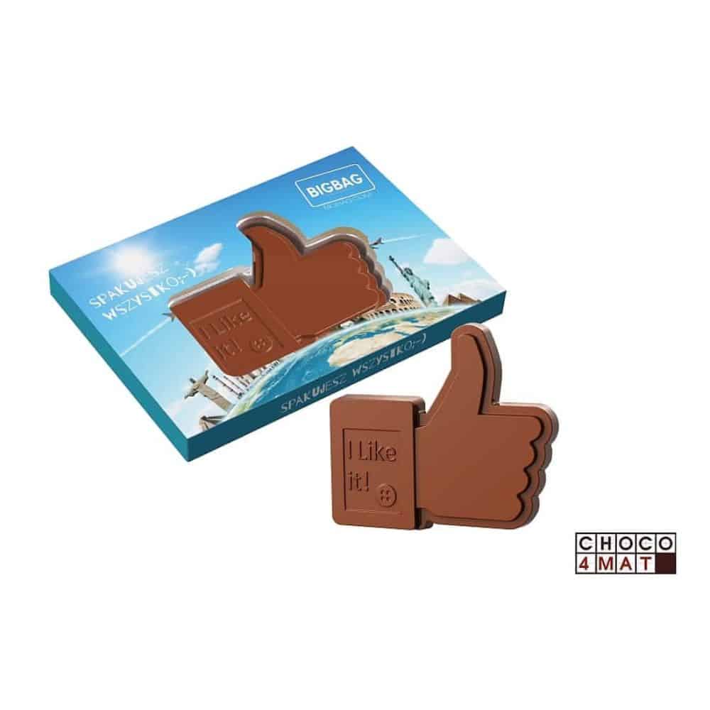 Chocolade duim omhoog in een blauwe doos met eigen ontwerp, met een losse duim ernaast