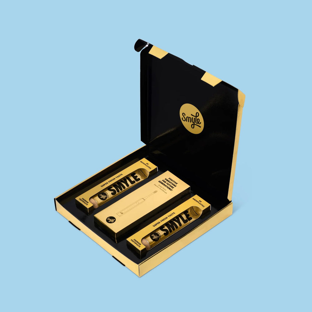 Smyle cadeauset goud in geschenkdoos met tandpasta en tandenborstel
