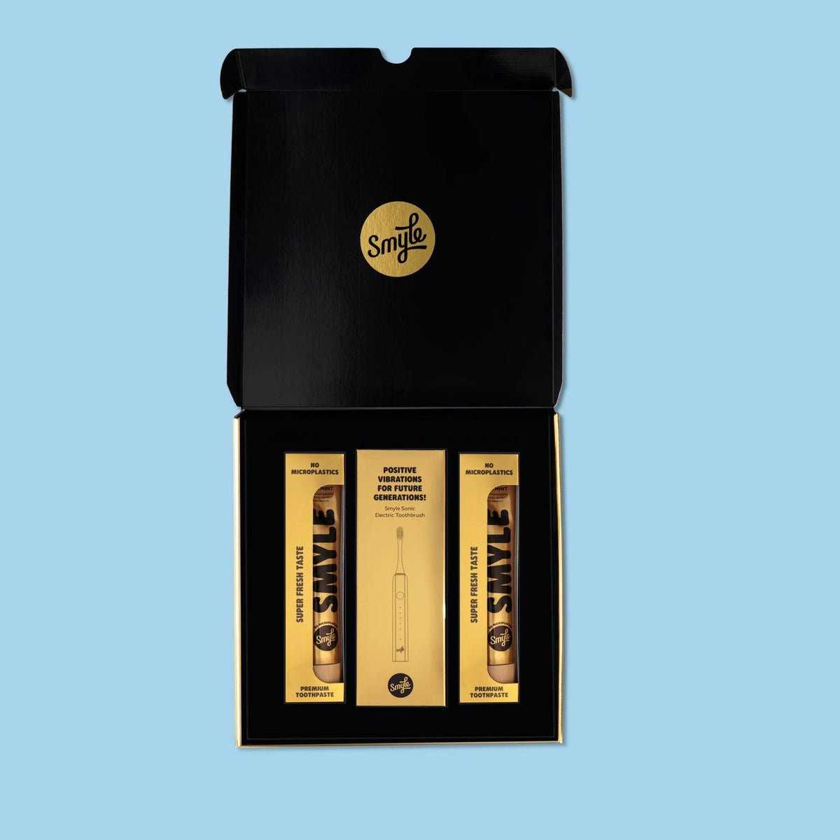 Smyle cadeauset goud in geopende zwarte geschenkdoos