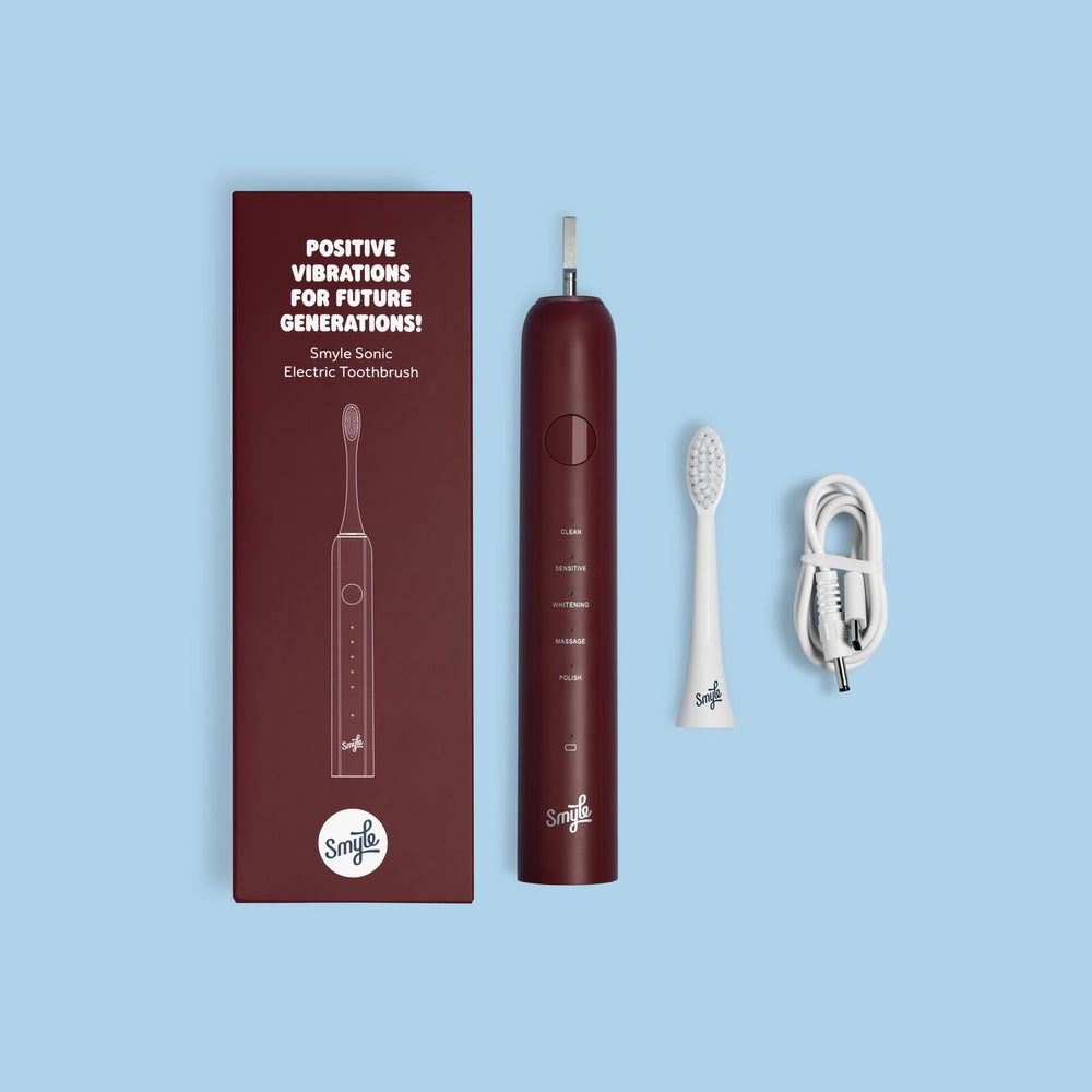 Smyle E-brush bordeauxrood met verpakking en oplaadkabel