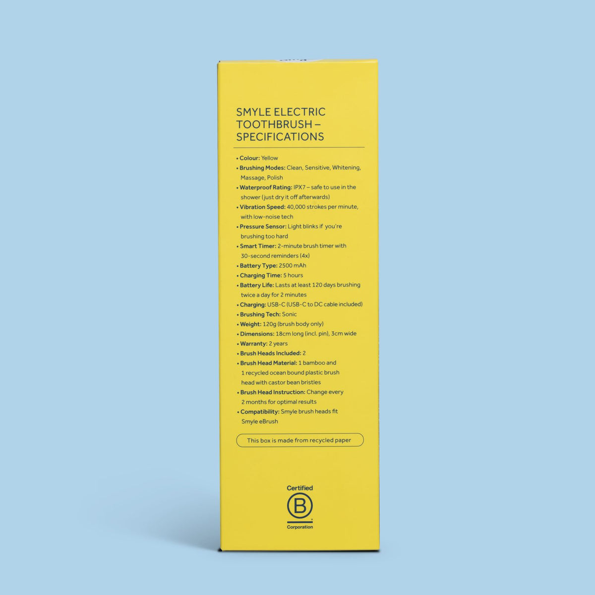 Achterkant van de verpakking van de Smyle elektrische tandenborstel Mellow Yellow