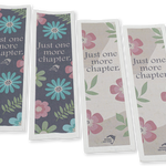 Vier bedrukte boekenleggers van zaadpapier met bloemenpatroon