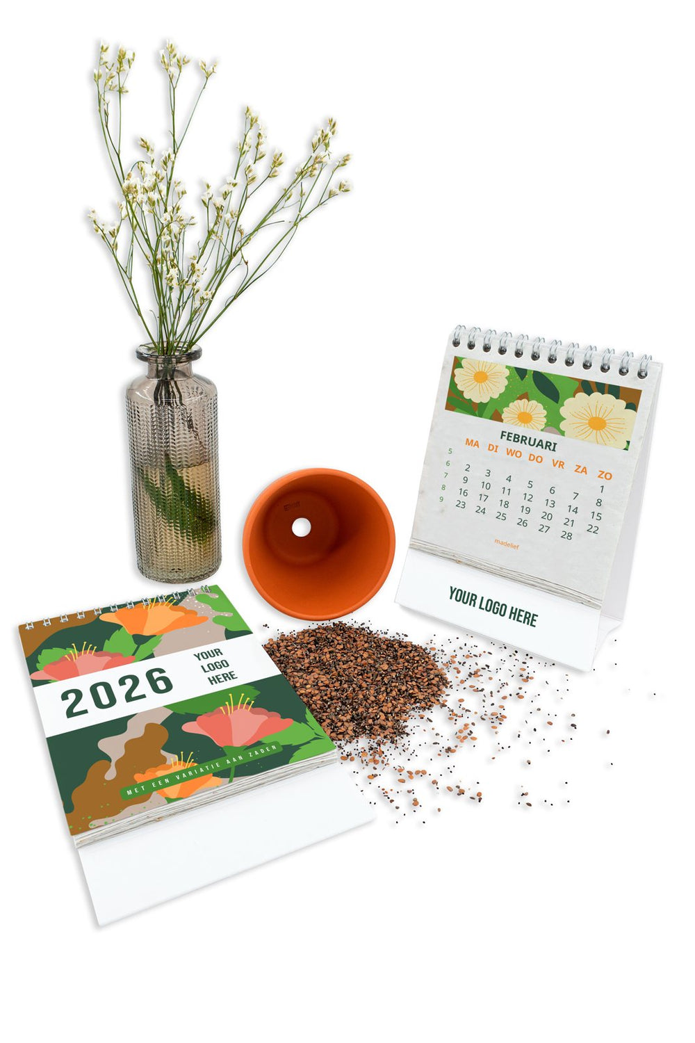 Zaadpapier bureaukalender met standaard, naast een vaasje en zaadjes
